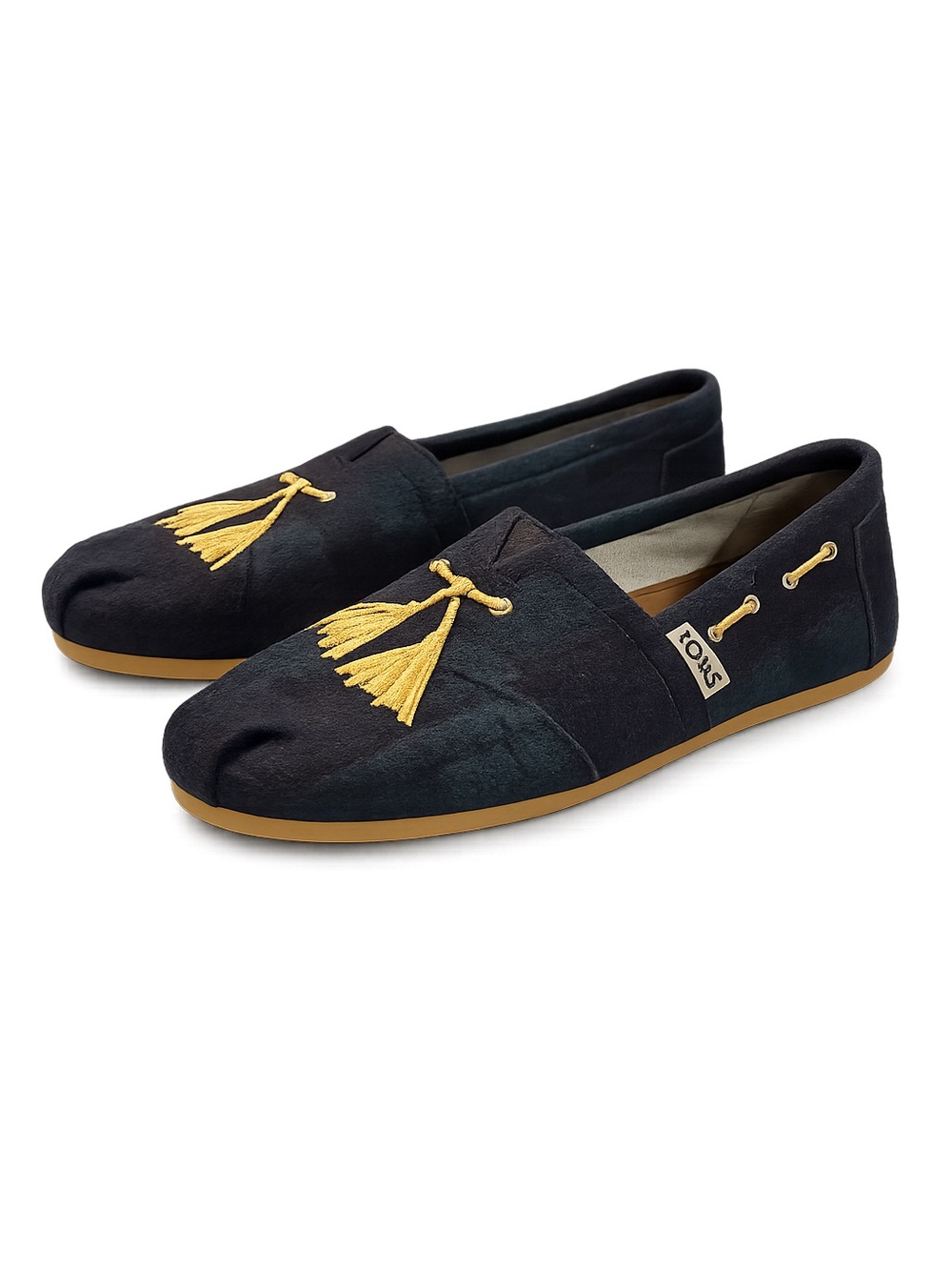 TOMS Black Canvas Tassel Loafers with Gold Accents